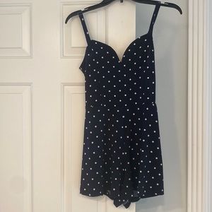 Navy and white polka dotted romper. From brand “Aeropostale”, size medium.